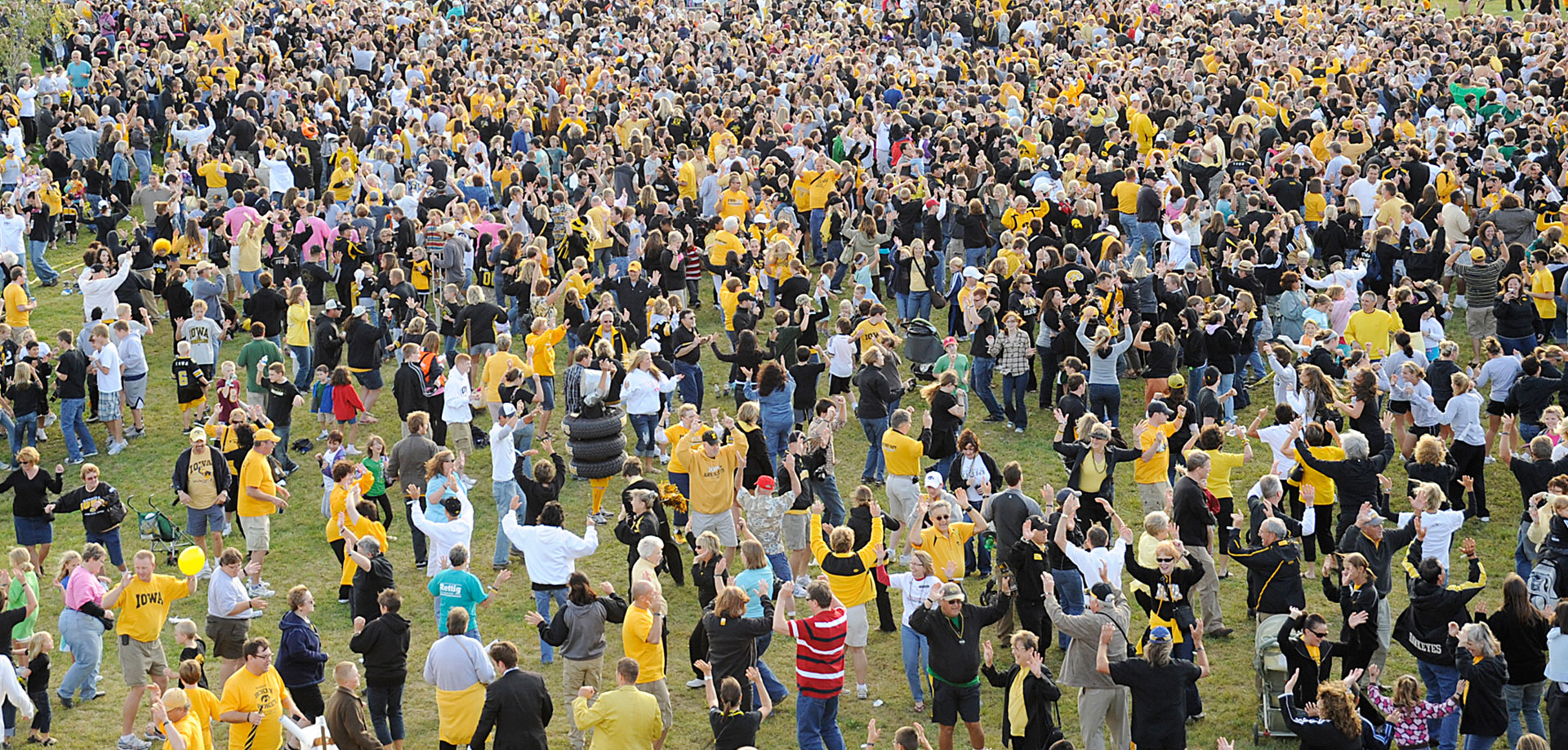 Large group of people doing the Hokey Pokey